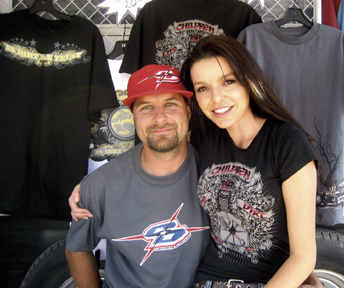 P.J. and Alicia are all smiles on the day they introduced their newly released Children of the Dirt hats and T-shirts to the public. The event took place at (where else?) a dirt bike race.